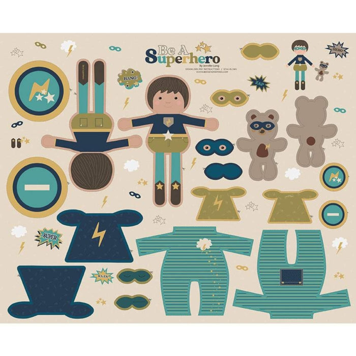 A digitally printed fabric panel titled 'Superhero Brave' showing various superhero-themed patterns including a doll wearing a superhero cape and mask, and accessories like a shield and pajamas. The panel is 43 1/2" x 36" and is made of 100% cotton.