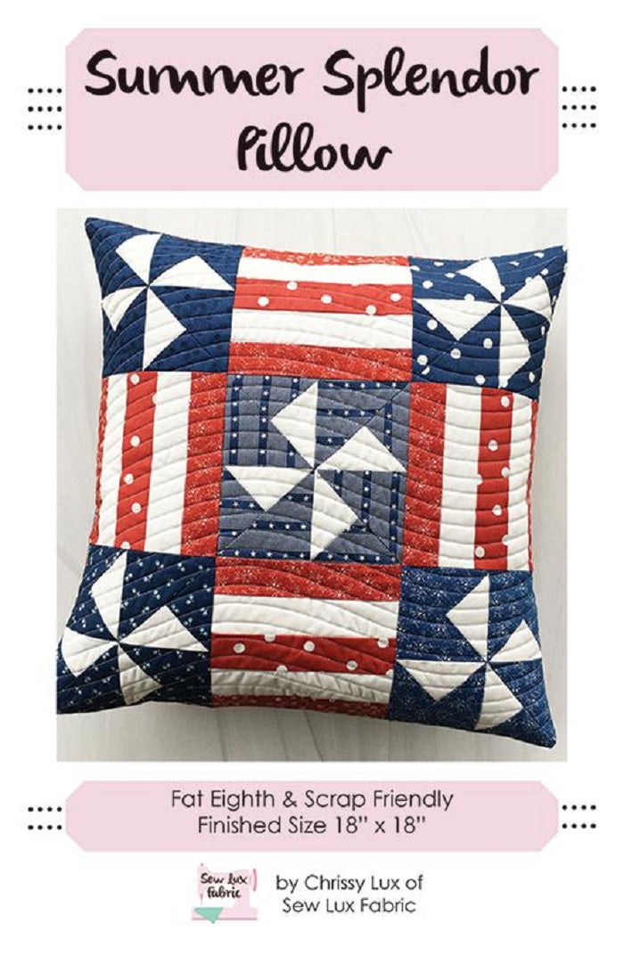 A finished 'Summer Splendor Pillow' by Chrissy Lux of Sew Lux Fabric, featuring a geometric pattern with red, white, and blue fabric.