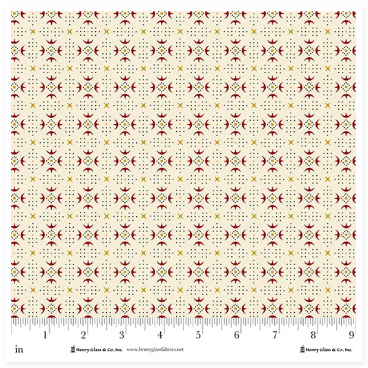 A fabric pattern swatch card showing a repeating geometric design in cream, rust red, and mustard yellow, with a ruler along the bottom edge and product text on the right.